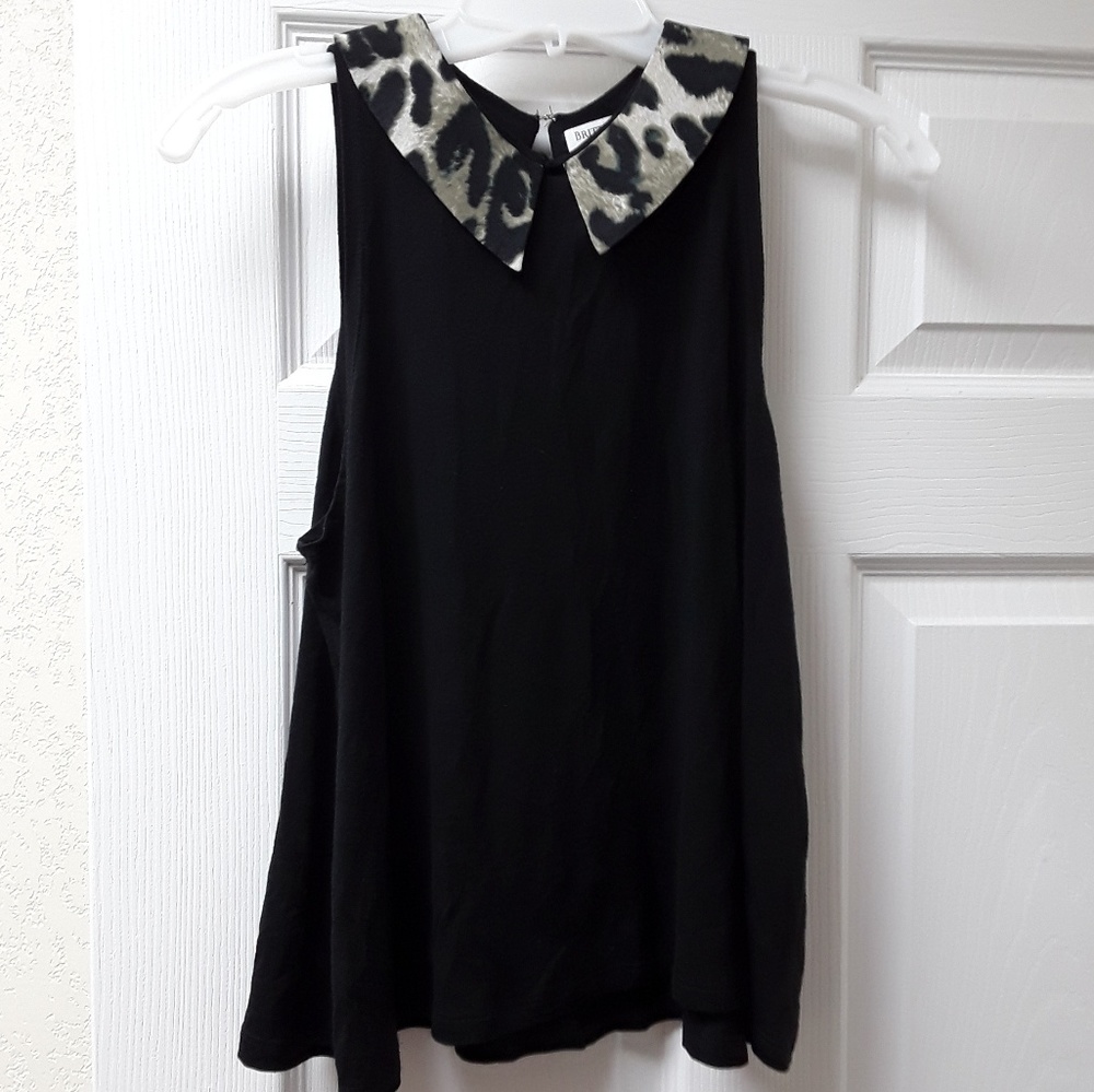 Black top with animal print on collar